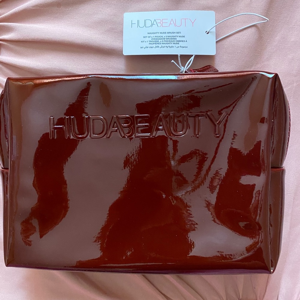 Huda Beauty Burgundy latex cosmetic bag✨